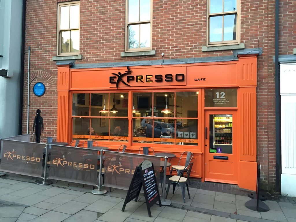 local business coffee shop front painted orange